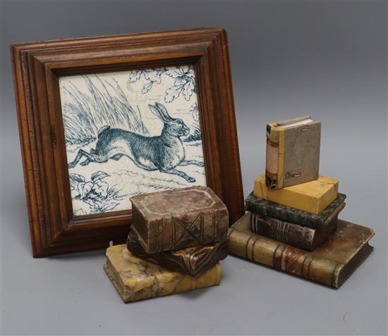 A Hare china teapot stand in wooden frame and eight marble books